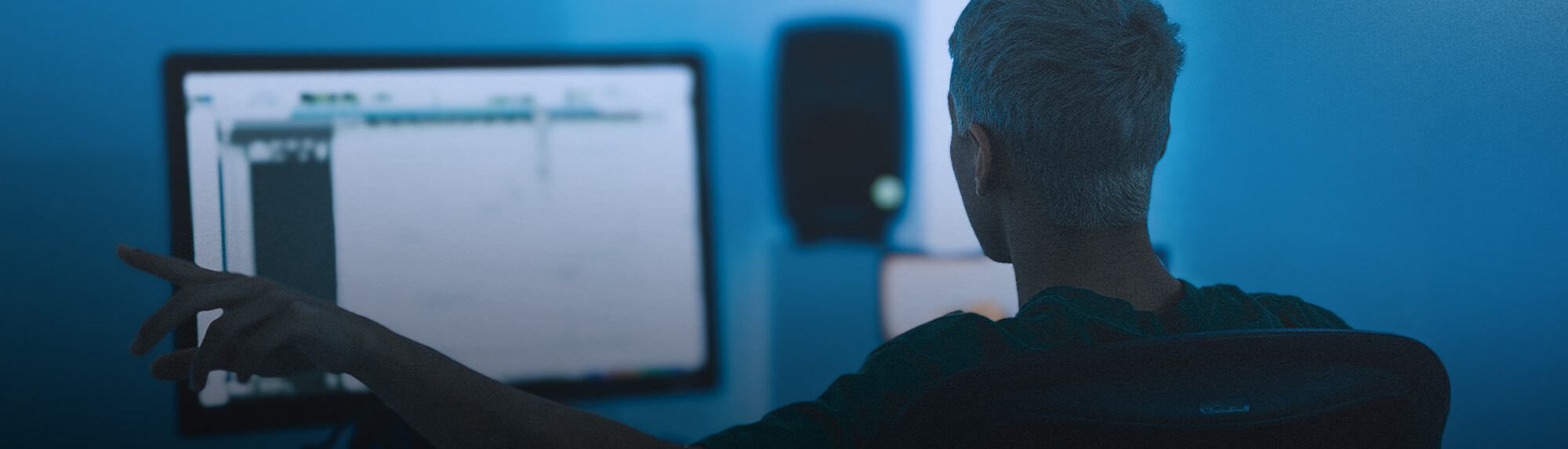 Man looking at a computer monitor