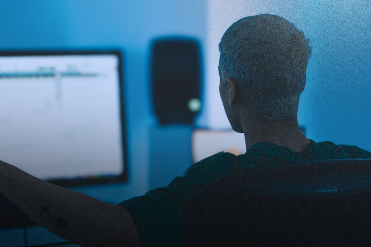 Man looking at a computer monitor