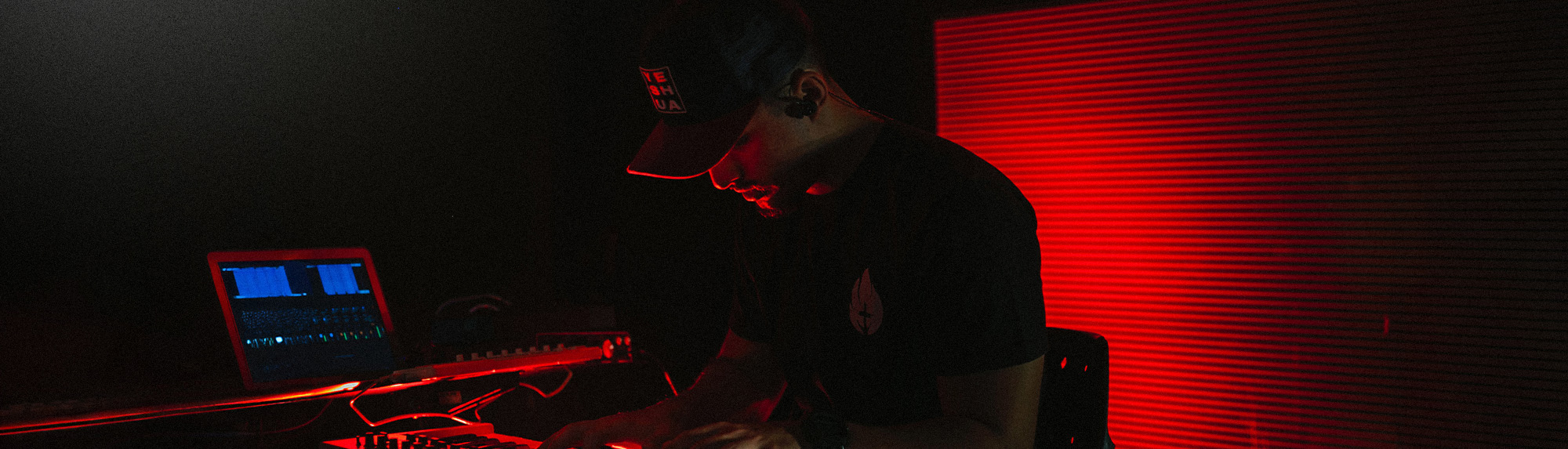 Man looking down in a music studio