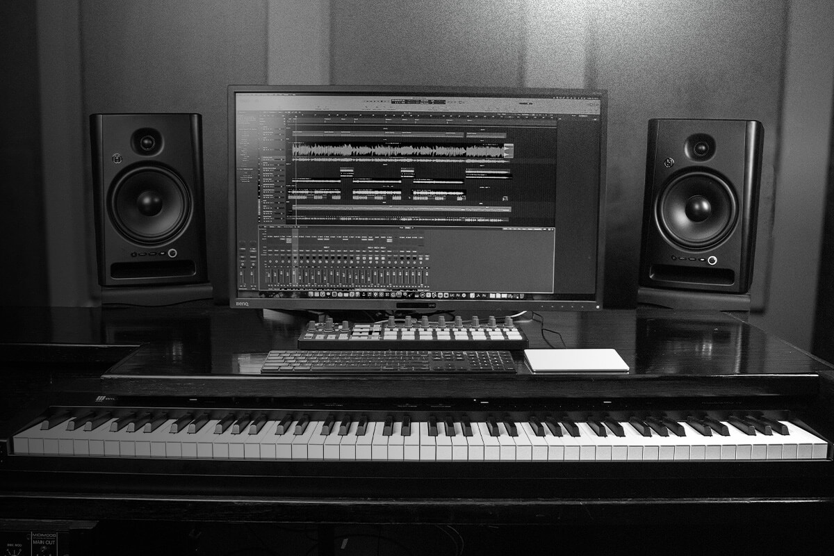 Two Harbinger SM508's on a desk with a computer monitor